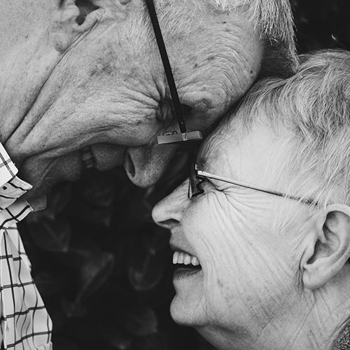 Laughing senior couple